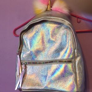 Under one sky holographic backpack (never used )